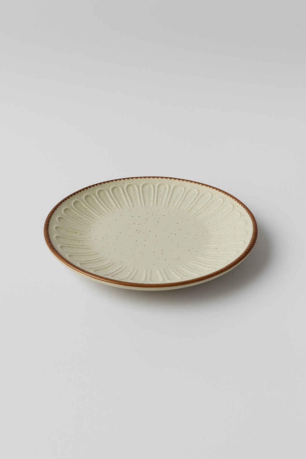 Artisan embossed plate - "7" ceramic